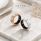 PULSE ONE Smart Ring von Veyra Health in Roségold und Silber mit Kristall-Band auf Marmor